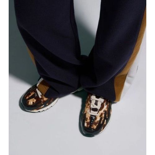 Diadora Mythos Propulsion 280 Jungle voor dames in cow print met bruin lakleer. Diadora Mythos Propulsion 280 Jungle voor dames in cow print met bruin lakleer.