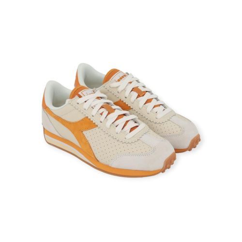 Diadora rally punched dames sneaker in wit en geel.