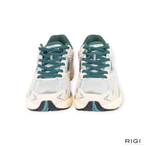 Etonic Elite Fluo in offwit leer met groen voor heren. Etonic Elite Fluo in offwit leer met groen voor heren.
