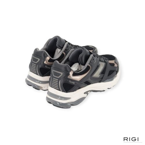 Etonic Elite Premium sneaker in zwart leer met suède voor dames. 