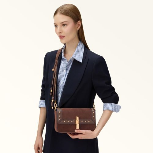 Furla Iride S crossbody in bruin suède met gouden studs . Furla Iride S crossbody in bruin suède met gouden studs .