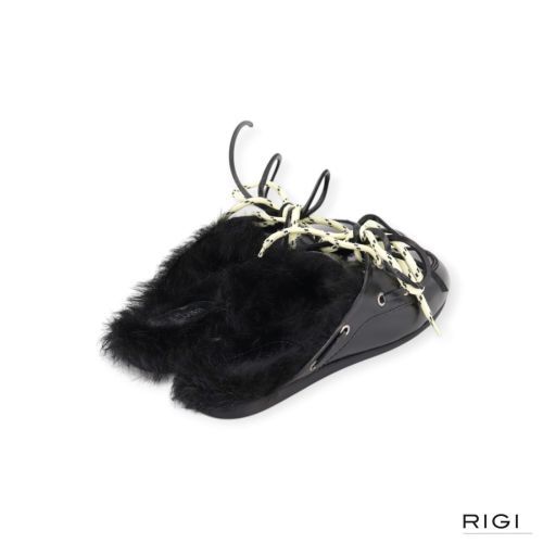 Posa boat loafer mule hairy fur dames slipper in zwart leer.
