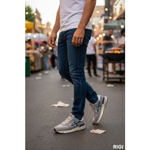 Premiata Mick heren sneaker in licht grijs met blauw.