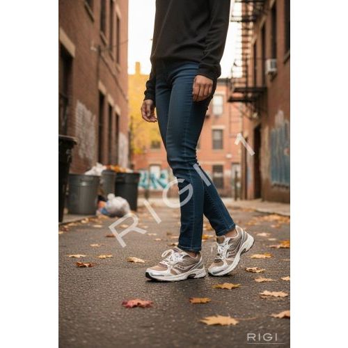 Saucony Grid Legacy sneaker in wit leer met beige mesh voor dames. 