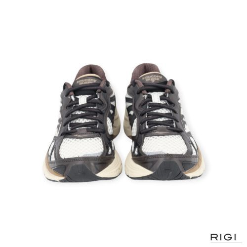 Saucony Progrid Guide 7 in bruin met wit leer voor dames. Saucony Progrid Guide 7 in bruin met wit leer voor dames.