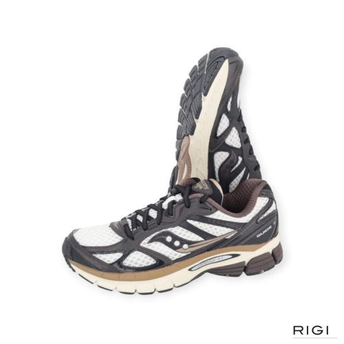 Saucony Progrid Guide 7 in bruin met wit leer voor dames. Saucony Progrid Guide 7 in bruin met wit leer voor dames.