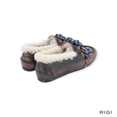 Toral Nahua Winter Gold mocassin voor dames in bruin leer met wol. Toral Nahua Winter Gold mocassin voor dames in bruin leer met wol.